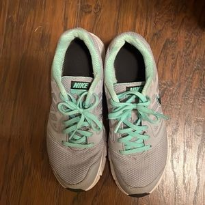 Mint green and gray Nike sneakers